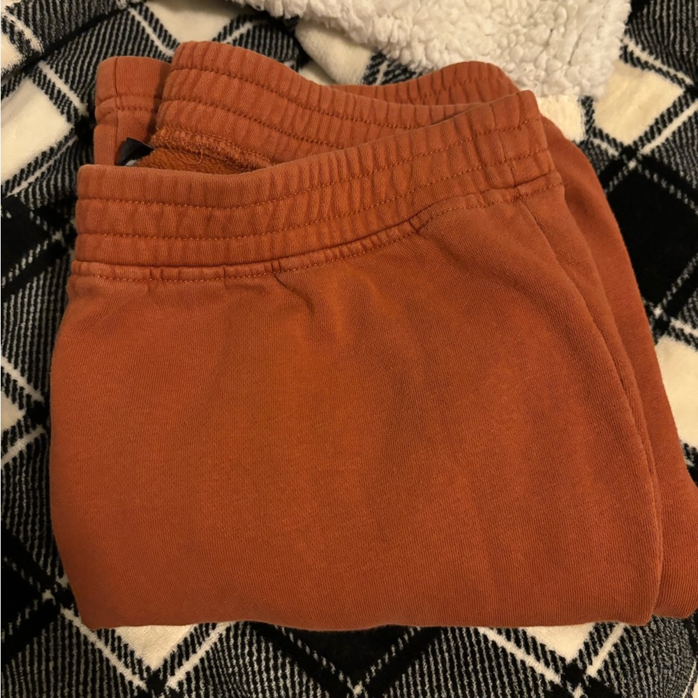 Dark orange sweat pants